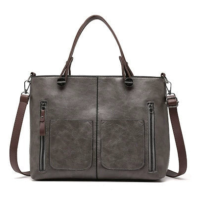 Bolsa transversal feminina PU grande capacidade 2023, nova moda europeia e americana, bolsa de ombro retrô, bolsa tote simples e moderna.