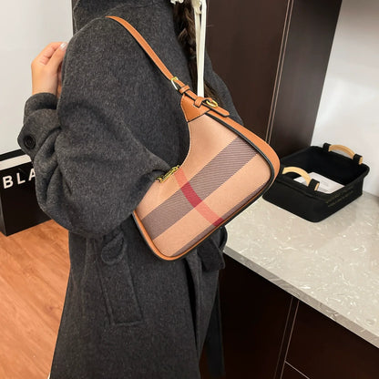 Bolsa transversal xadrez para mulheres 2026. Nova coleção. Estilo nicho, bolsa de ombro de luxo leve. Moda. Bolsa de mão transversal com senso de elegância.