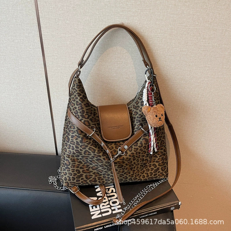 Bolsa de Ombro Feminina Estampa de Leopardo 2025 Nova Moda Bolsa de Axila Preguiçosa Bolsa Tote Feminina Bolsa de Ombro Transversal Bolsa Concha