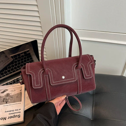 Bolsas de nicho de alto padrão para mulheres, nova coleção primavera/verão 2026, bolsa vintage versátil de ombro e transversal, bolsa feminina popular.