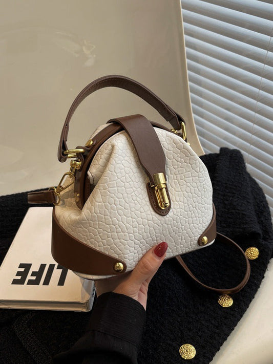 Bolsas femininas de luxo transfronteiriças 2026: Nova tendência, bolsa de mão e transversal versátil e moderna com textura simples e alça de ombro.