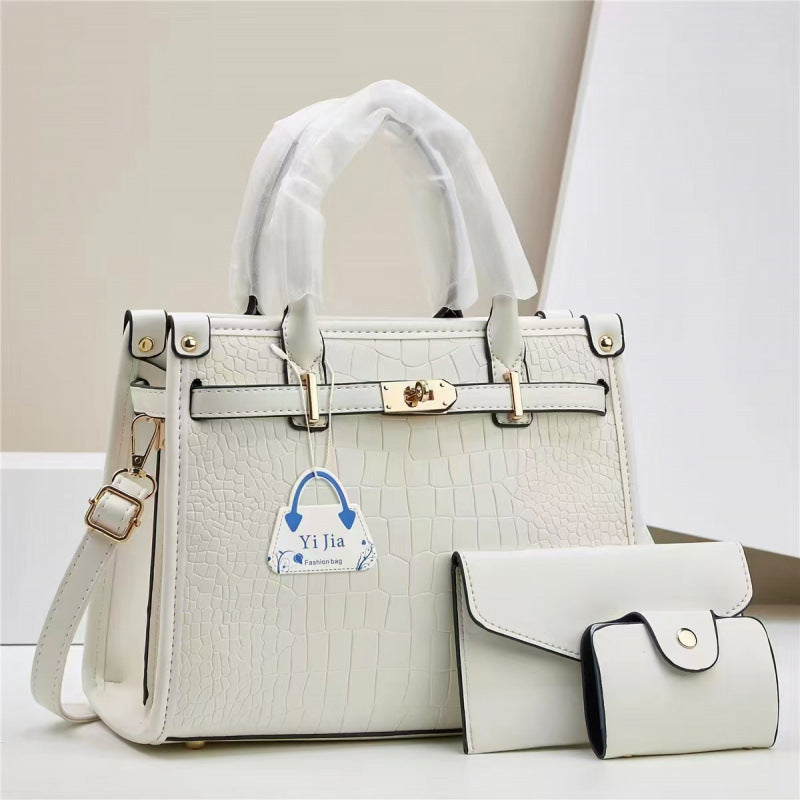 Bolsa de mão nova padrão de pedra bolsa para sogra cor pura design moderno exportação taizhou bolsa feminina bolsas transfronteiriças