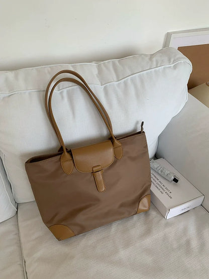 Bolsa tote prática de grande capacidade para estudantes femininas, versátil para deslocamentos, bolsa feminina de ombro único em tecido Oxford e nylon, bolsa tote transfronteiriça.