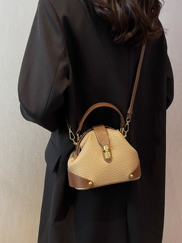 Bolsas femininas de luxo transfronteiriças 2026: Nova tendência, bolsa de mão e transversal versátil e moderna com textura simples e alça de ombro.