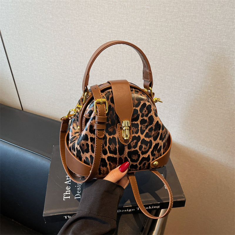 Bolsas femininas de luxo transfronteiriças 2026: Nova tendência, bolsa de mão e transversal versátil e moderna com textura simples e alça de ombro.