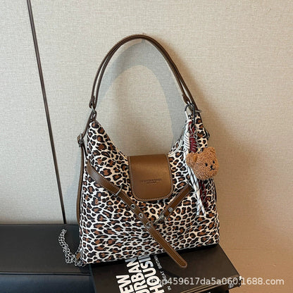 Bolsa de Ombro Feminina Estampa de Leopardo 2025 Nova Moda Bolsa de Axila Preguiçosa Bolsa Tote Feminina Bolsa de Ombro Transversal Bolsa Concha