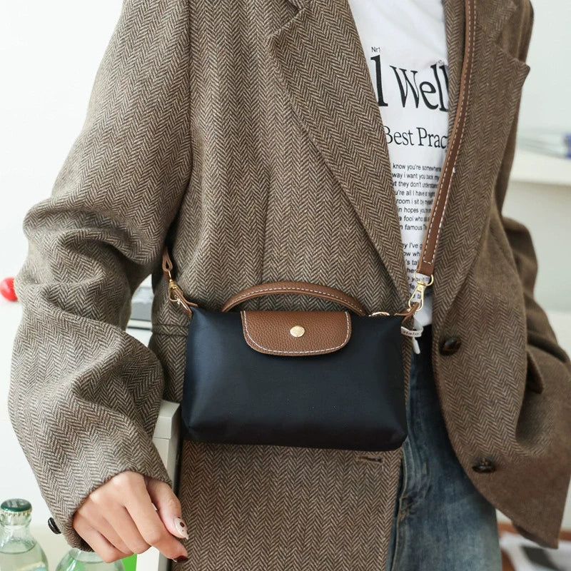Nova Bolsa Dumpling de Nylon 2026 - Bolsa Transversal Feminina para Fornecimento Internacional - Bolsa Mini Quadrada Casual e Versátil para o Dia a Dia