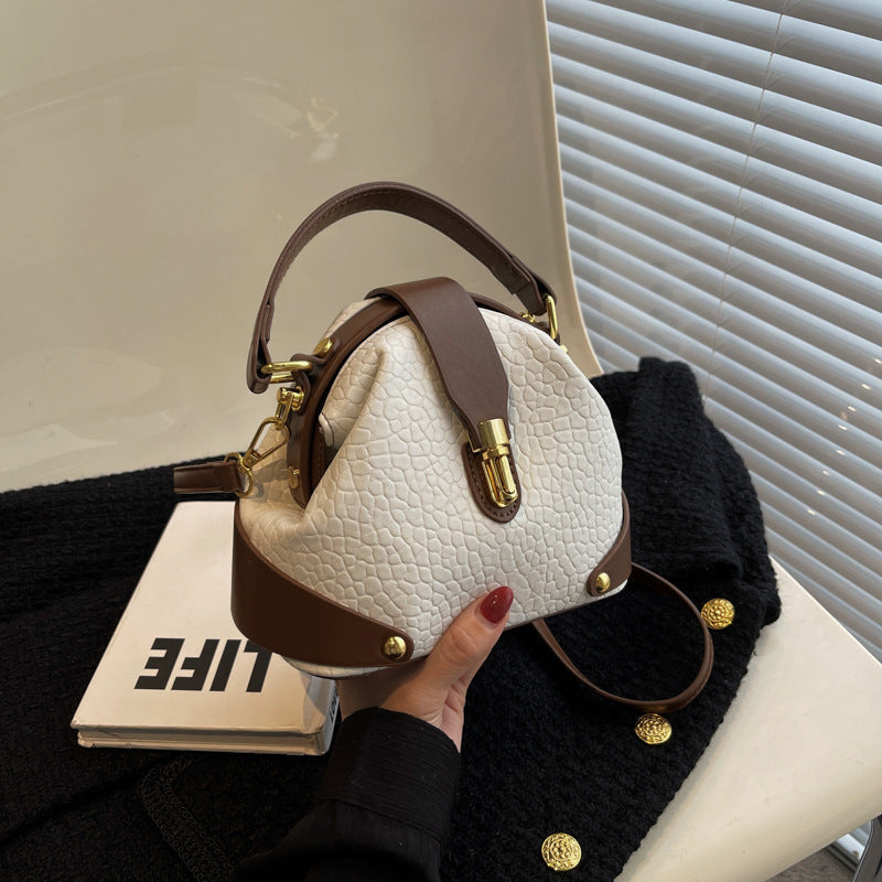 Bolsas femininas de luxo transfronteiriças 2026: Nova tendência, bolsa de mão e transversal versátil e moderna com textura simples e alça de ombro.