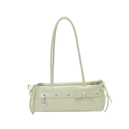 Bolsa baguete de alto estilo para mulheres, uma bolsa de ombro de couro fresca e versátil, uma bolsa moderna e versátil para mulheres jovens.