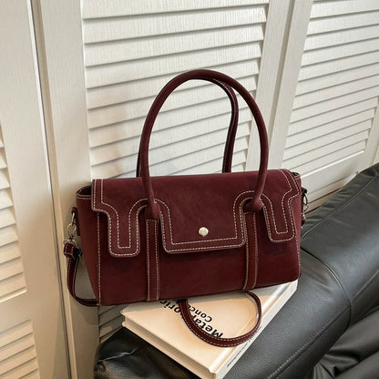 Bolsas de nicho de alto padrão para mulheres, nova coleção primavera/verão 2026, bolsa vintage versátil de ombro e transversal, bolsa feminina popular.