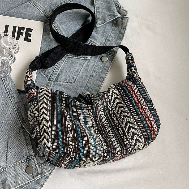 Bolsa étnica de grande capacidade, estilo novo e moderno de 2024, bolsa transversal tipo dumpling, estilo retrô versátil, bolsa de ombro feminina.