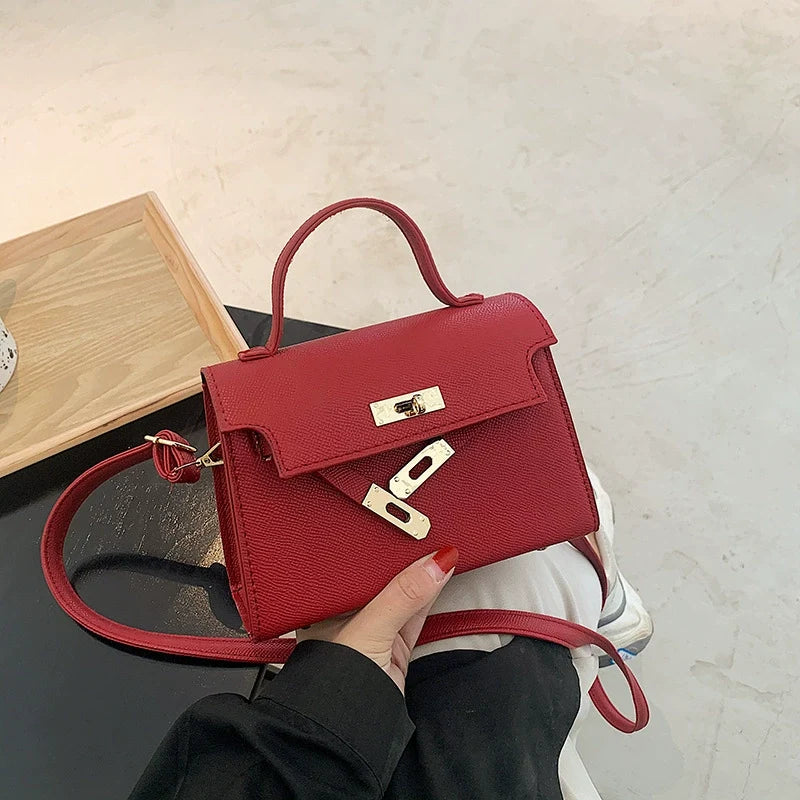 Nova Bolsa Feminina Versátil 2026: Bolsa Retrô Kelly de Ombro Único Transversal Pequena Quadrada – Atacado