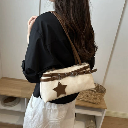 Bolsas femininas para comércio exterior transfronteiriço, nova bolsa de ombro colorida e moderna para o verão de 2026, bolsa de ombro versátil e de nicho, bolsa de mão.