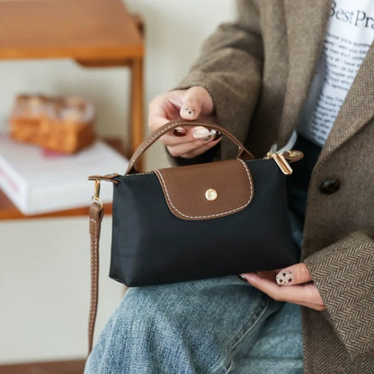 Nova Bolsa Dumpling de Nylon 2026 - Bolsa Transversal Feminina para Fornecimento Internacional - Bolsa Mini Quadrada Casual e Versátil para o Dia a Dia