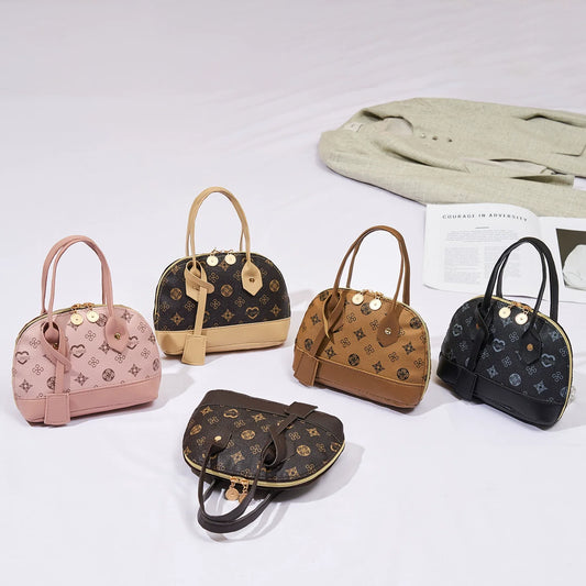 2026 Nova Moda, Luxo Leve, Niche Monica & Friends Bolsa Feminina de Alto Padrão - Bolsa Shell com Bloco de Cores Estampado