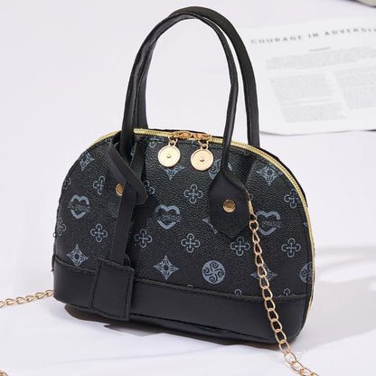 2026 Nova Moda, Luxo Leve, Niche Monica & Friends Bolsa Feminina de Alto Padrão - Bolsa Shell com Bloco de Cores Estampado