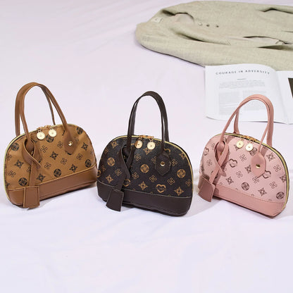 2026 Nova Moda, Luxo Leve, Niche Monica & Friends Bolsa Feminina de Alto Padrão - Bolsa Shell com Bloco de Cores Estampado
